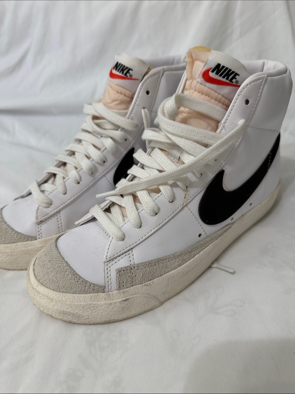 Nike Vintage White High-Top Sneakers with Black Swoosh and Beige Accents